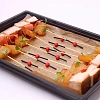 Канапе с филе индейки и ананасом фламбе