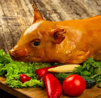 Поросенок молочный, фаршированный гречкой и грибами