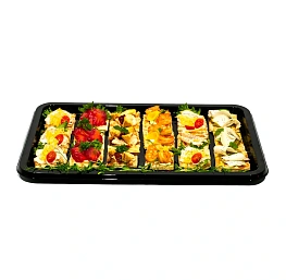 Большое Ассорти Римских брускетт: с тигровой креветкой, с маринованным лососем, с артишоками и вяленым томатом, с козьим сыром и муссом из авокадо, с цыпленком. 18 шт.