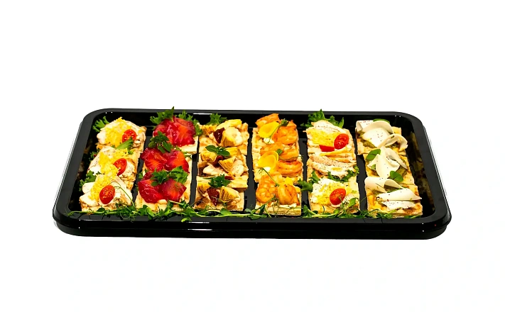 Брускетты : Большое Ассорти Римских брускетт: с тигровой креветкой, с маринованным лососем, с артишоками и вяленым томатом, с козьим сыром и муссом из авокадо, с цыпленком. 18 шт.